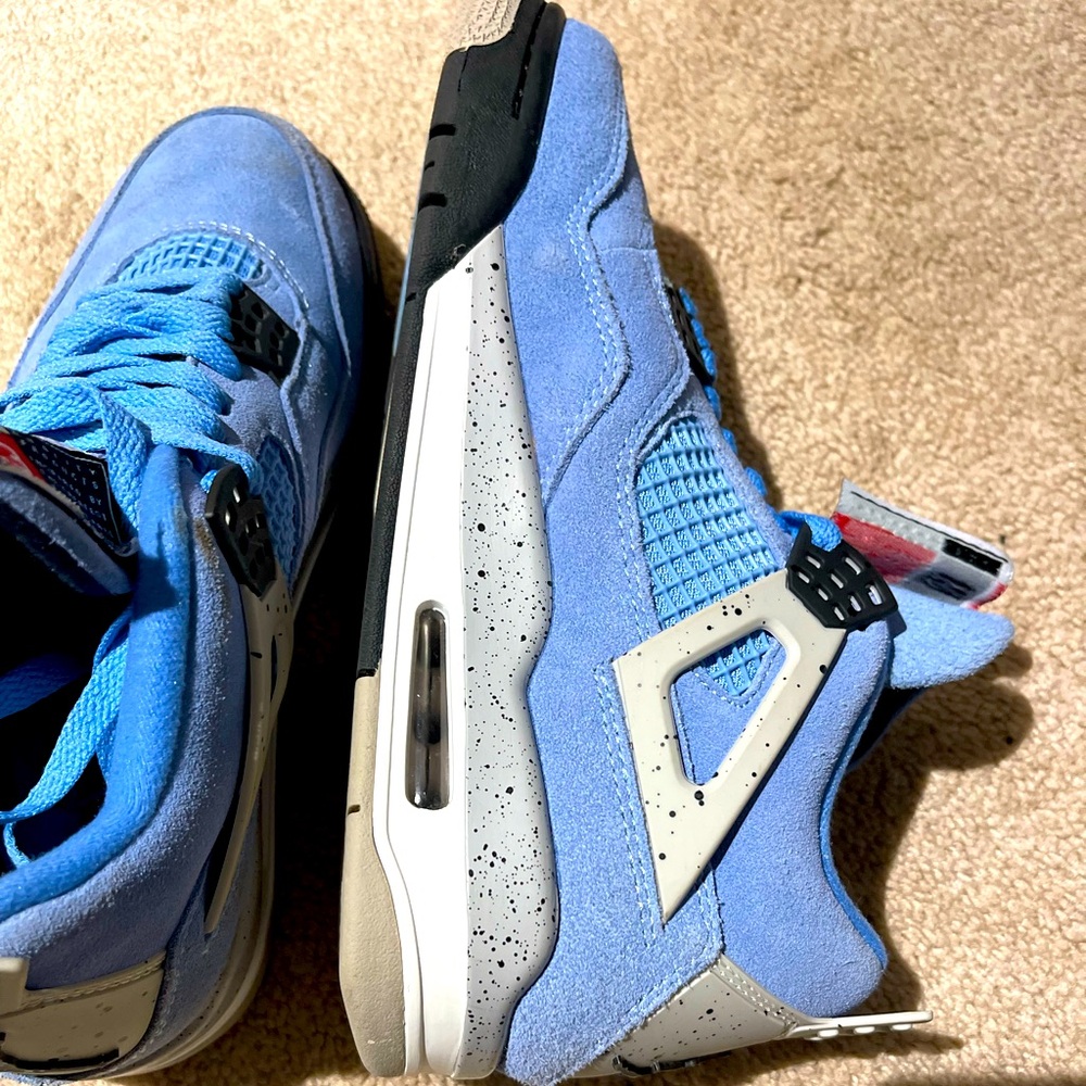 University blue Jordan 4’s